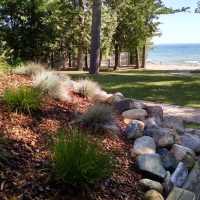 ornamental grasses flagstone firepit paver walkway stone retaining wall